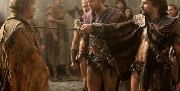 Crixus (Manu Bennett) holds Caesar (X) at bay in Spartacus 3x04