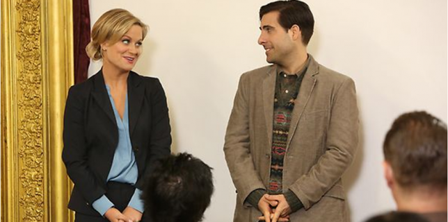 Leslie (Amy Poehler) and Dennis (Jason Schwartzman), preserving Pawnee intellectual culture one government funded porn shop at a time