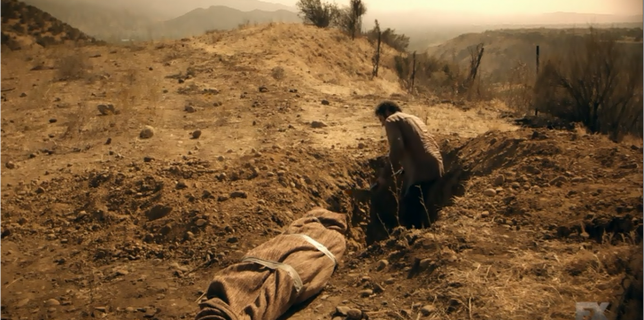 Linder (Thomas M. Wright) buries the body of his assailant moments in The Bridge 1x05